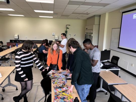 Students in classroom reviewing materials